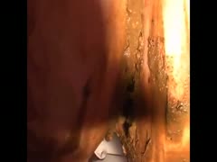 A sexy woman fingering her feces and pussy